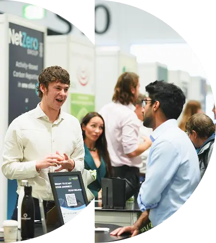 Delegates talking at an exhibitor stand